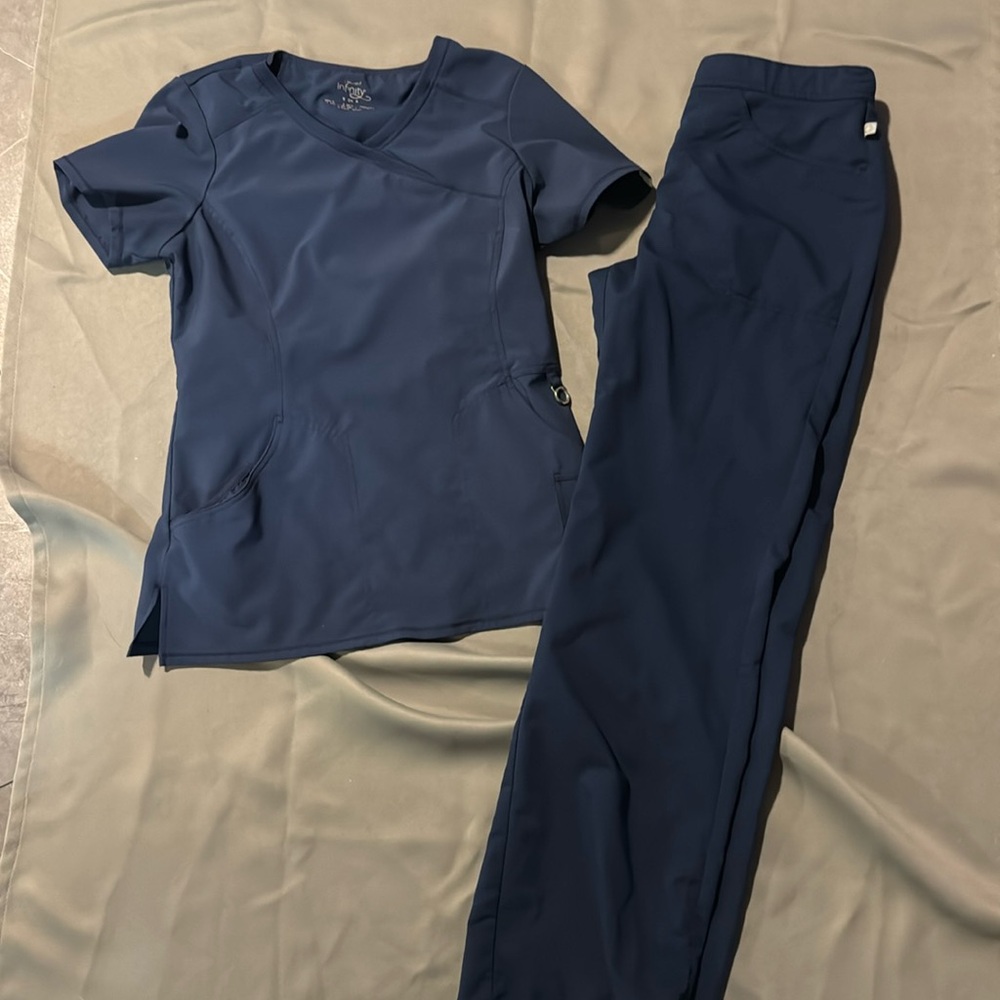 Infinity scrub top and code happy bottoms both size small. Navy